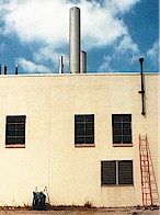 Wheelbarrow, Ladder   and
    Smokestacks